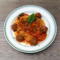 SPAGHETTI & MEATBALLS · Spaghetti with our homemade beef  meatballs in our tomato sauce 