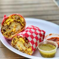 Bacon Burrito · Include 3 eggs, bacon, hash browns, cheese & salsa on the side.