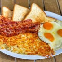 Bacon & Eggs · Served with 3 eggs, hashbrowns or home fries, toast and jelly.