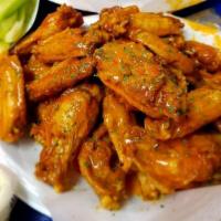 Buffalo Wings Platter · 10 pieces with french fries, macaroni salad, garden salad and garlic bread. Served with bleu...