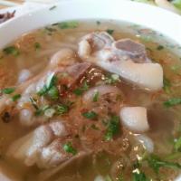 Banh Canh Gio Heo · Vietnamese thick rice noodle soup with pork hock.
