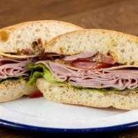 Ham and Swiss Sandwich Combo  · Ciabatta, black forest ham, Swiss cheese, lettuce, tomato and stoneground mustard. Served wi...