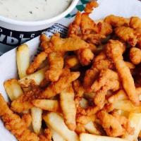 Clam Strips ’N Chips · Baskets prepared to order, sizzling fresh, served with fries, ketchup and our house-made tar...