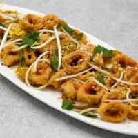 Shanghai-style Calamari · Sweet chili glaze, bean sprouts, cherry peppers, crushed peanuts & scallions.