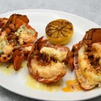 Petite Lobster Tail Trio · 3 petite cold water lobster tails broiled, sriracha tomato butter, almond herb butter, uni b...