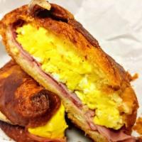 Burne Special · 2 eggs, melted Swiss cheese on croissant.