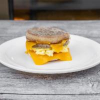 Egg Muffins · 2 eggs, and sausage, melted cheese on English muffin.