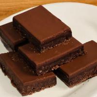 Fudge Brownie · Moist dark chocolate fudge brownie w/ chocolate icing