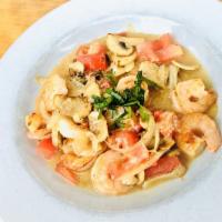 GF Shrimp “Scampi Style” · White shrimp sautéed in white wine butter sauce w/ roasted garlic, tomato, basil & mushrooms