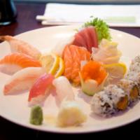 Sushi and Sashimi Combination · Ten pieces of sashimi, five pieces of sushi and one California roll. Served with soup or sal...