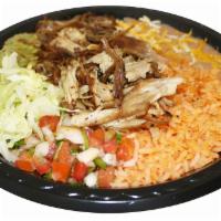 13. Carnitas Combination Plate · Served with rice and beans.