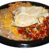 21. Huevos Rancheros Combination Plate · Served with rice and beans.