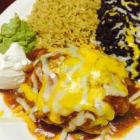 Beans Chimichanga · A fried flour tortilla stuffed with Mi Casa beans. Topped with cheddar jack cheese and our s...