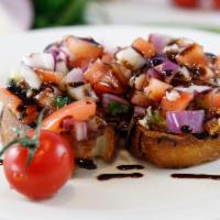Bruschetta (3 pieces) · Garlic rubbed and toasted italian bread covered with diced tomatoes, onions, garlic, basil, ...