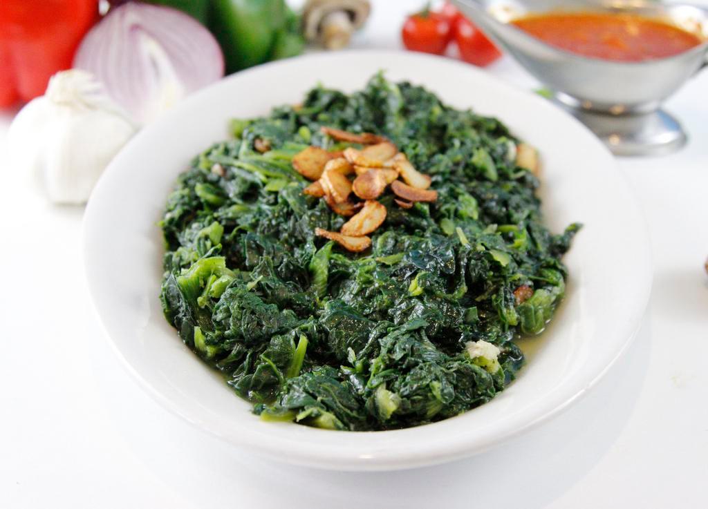 Pasta with Spinach Garlic and Oil · The spinach is sautéed in garlic and oil toghether with your pasta cut of choice.