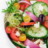 Greek Salad · Mesculine greens, cucumbers, feta cheese, kalamata olives, jullienned red onions, peppers, s...