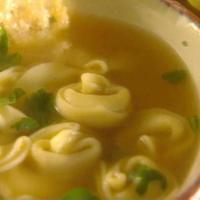 Tortellini in Brodo Soup · A delicate chicken consommé with cheese tortellini and a sprinkle of parsley. Culinarily spe...