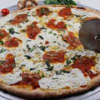 Mona Lisa Pizza · Pizza comes with fresh mozzarella, marinara sauce and basil chiffonade