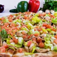 Chicken Caesar Salad Pizza · Pizza comes with romaine lettuce, chicken, romano grated cheese and caesar dressing