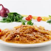Pasta with Vodka Sauce · No I.D. required, the alchool content of the vodka evaporates leaving you a pink creamy sauc...
