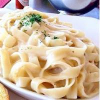 Pasta with Alfredo Sauce · A creamy white sauce made with the right proportion of heavy cream and grated cheese.