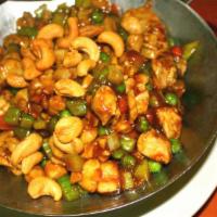 C2. Chicken with Cashew · Diced peas, carrots, celery, water chestnuts and sliced white meat chicken sauteed in a ligh...