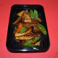 B3. Beef with Black Mushrooms and Bamboo Shoots · Black mushroom, snow peas, carrots and bamboo shoots sauteed in a flavorful brown sauce.