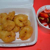 S1. Sweet and Sour Shrimp · Deep fried battered shrimp topped with a warm sweet sauce mixed with pineapple, carrots, whi...