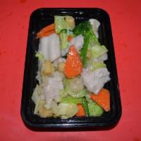 AC9. Stir Fry Fish with Vegetables · White fish chunks stir fried with cabbage, broccoli, water chestnuts and carrots in aa fragr...