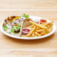 Lamb Gyro Combo · Grilled lamb topped with lettuce, tomato, herbed red onions, banana peppers, homemade herbed...