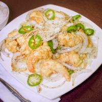 F6 - Salt and Pepper Shrimp · Battered jumbo shrimp sauteed and pan fried with jalapenos, and onions. Spicy.  Served with ...