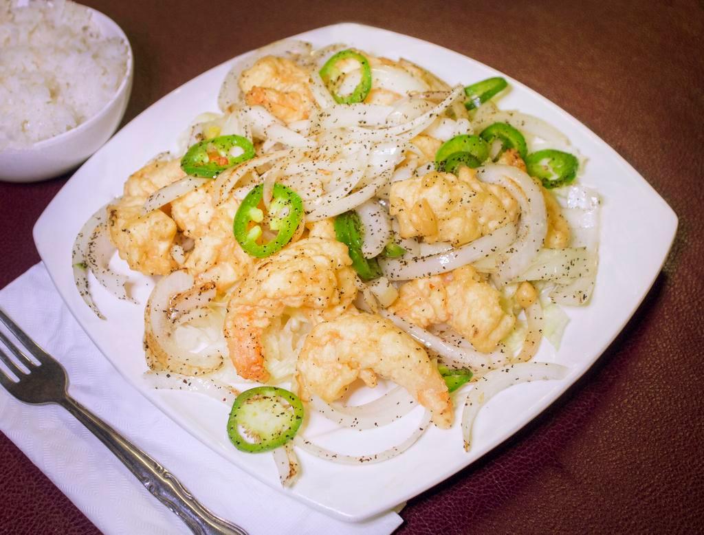 F6 - Salt and Pepper Shrimp · Battered jumbo shrimp sauteed and pan fried with jalapenos, and onions. Spicy.  Served with a side of rice.