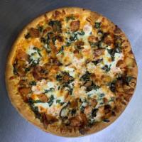 Margherita Pizza · Signature marinara, sliced mozzarella, tomatoes, and basil