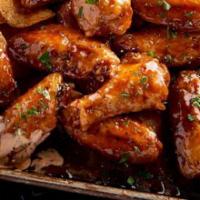 Tavern Wings (Brunch) · Tossed in your choice of sauce and served with a choice of ranch, bleu cheese, or sriracha r...