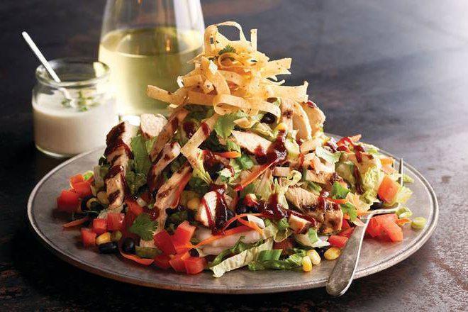 BBQ Chicken Salad (Brunch) · Grilled chicken with roasted corn, black beans, jicama, tomato, green onions, cilantro, and crisp corn tortilla strips. Topped with house-made ranch dressing and whiskey BBQ sauce.