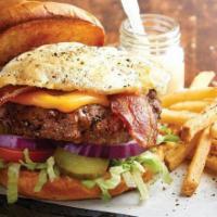 The Farmhouse Burger (Brunch) · American cheese, bacon, a fried egg, lettuce, tomato, pickles, onion, and a side of signatur...