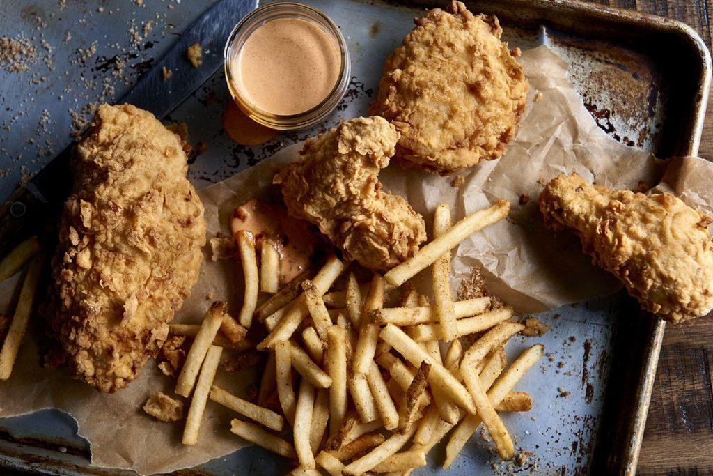 Chicken Tenders · Hand-battered chicken tenders.  Served with coleslaw, fries and choice of whiskey barbecue sauce, honey mustard or ranch dipping sauce 
