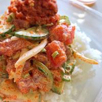 Spicy Ahi Bowl · Ahi Tuna, spicy tuna, onion, green onion, cucumber, jalapeno pepper, masago and Sriracha aio...