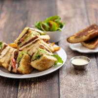 Crepevine Club Sandwich · Freshly grilled chicken breast on sourdough with crispy bacon, avocado, lettuce, tomatoes an...