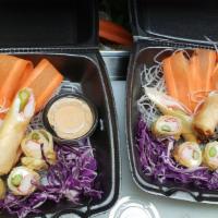 Crab Egg Roll 2 Ways · Kanikama, asparagus and cream cheese wrapped in rice paper then fried.