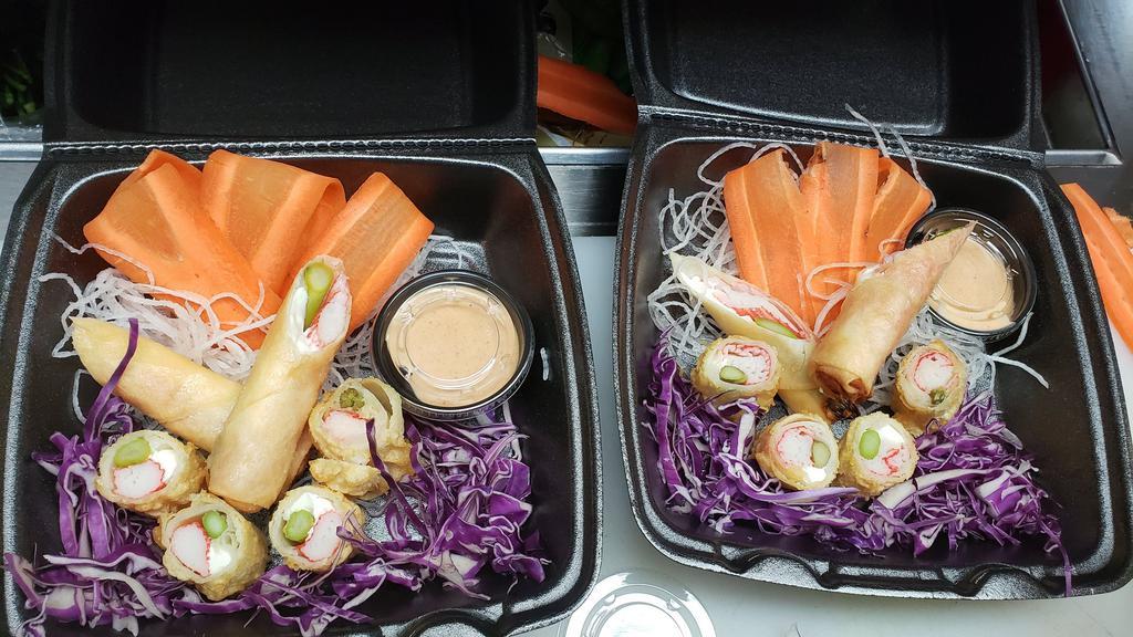 Crab Egg Roll 2 Ways · Kanikama, asparagus and cream cheese wrapped in rice paper then fried.