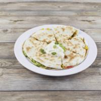 Avocado and Corn Quesadilla · Flour tortillas grilled to perfection and stuffed with cheddar and monterey Jack cheese, avo...