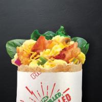 Awakin' with Bacon · Bacon, egg, spinach, green peppers, onions, cheddar, ancho chipotle, salt, and pepper.