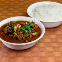 GOAT CURRY · Goat cooked in special masalas. Spicy taste.