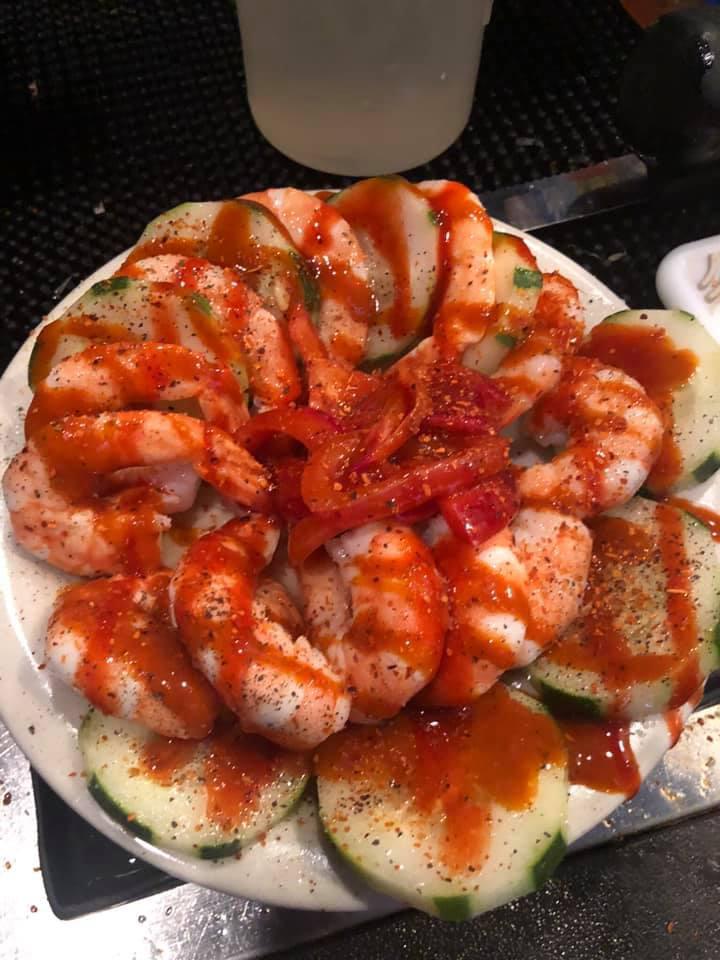 Camarones Botaneros · Delicious small platter of cold peeled shrimp served with sliced cucumber and citric red onion, squeezed lime and valentina hot sauce.