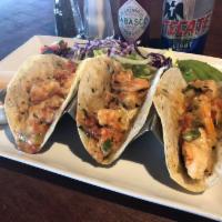 Shrimp Tacos · 3 pieces. Shrimp grilled and sauteed in butter, spices and served with rice.