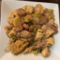 Chicken Scarpiello · Sauteed breast of chicken, sausage, potatoes and onions in a garlic brodino sauce.