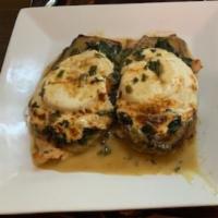 Chicken Venice · Sauteed chicken topped with eggplant, spinach, fresh mozzarella and sliced tomatoes served i...
