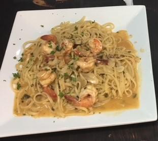 Shrimp Scampi · Shrimp sauteed with garlic and olive oil in a lemon butter sauce.