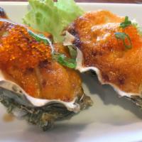 5. Baked Oysters · 2 pieces. Baked oysters with spicy mayo sauce, onion, and tobiko. Spicy.